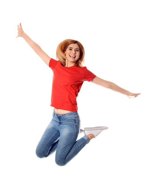 Full length portrait of happy beautiful woman jumping on white background - Foto, immagini