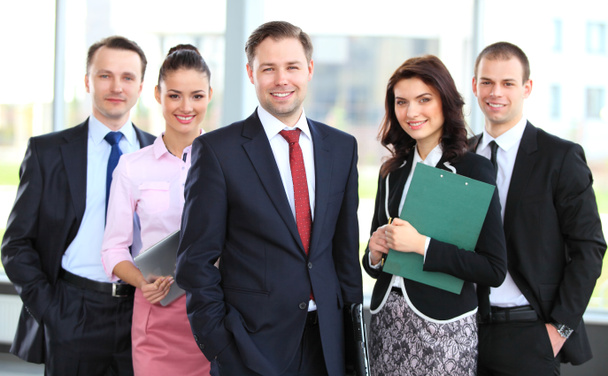 Group portrait of a professional business team looking confidently at camera - Photo, Image
