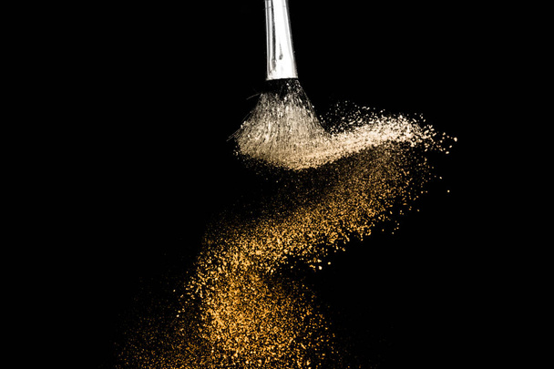 golden powder splash and brush for makeup artist - Фото, зображення