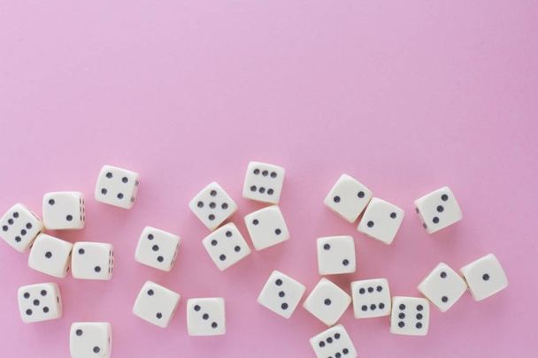 White gaming dices on violet background. victory chance and lucky. Flat lay style, place for text. Top view and Close-up cube. Concept business, gamble and game. Spectacular background pastel. - Foto, afbeelding