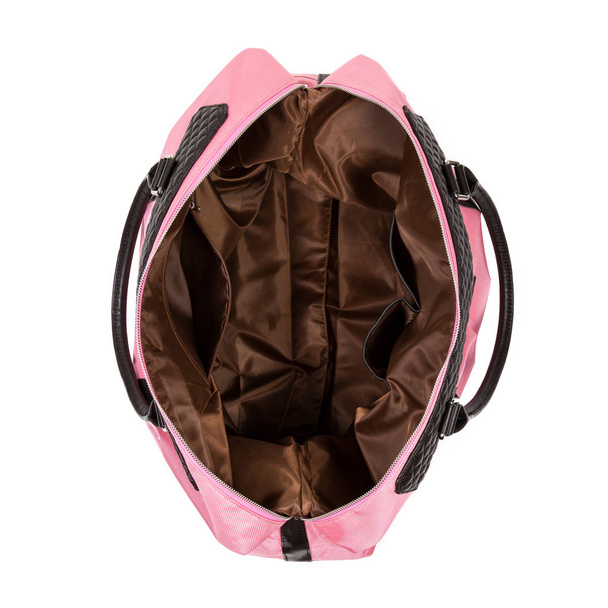 вид сверху на открытую розовую сумку
 - Фото, изображение