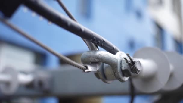 Joint hinge with a steel cable. Frame. The connection of metal staples, loops and steel ropes - Footage, Video