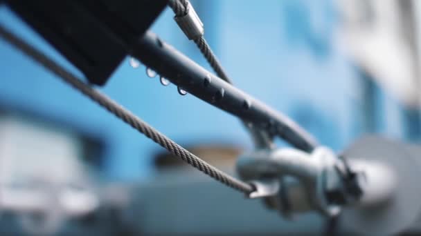 Connection with a steel cable. Frame. Close-up of metal parts - Footage, Video