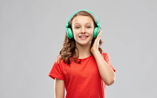 happy teenage girl with headphones - Фото, изображение