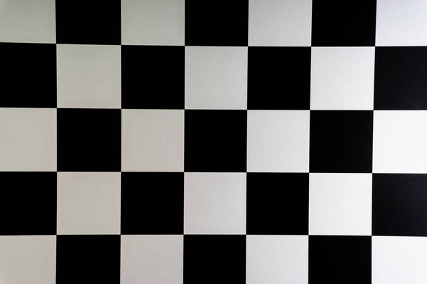 Šachová deska detailní pozadí. Selektivní fokus a plodin fragment - Fotografie, Obrázek