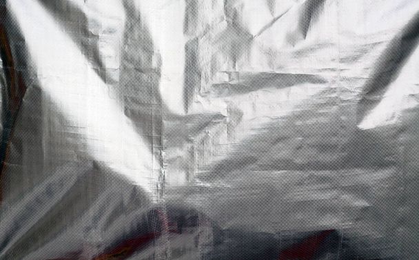 Texture d'enveloppe en plastique métallisé avec des miettes
. - Photo, image