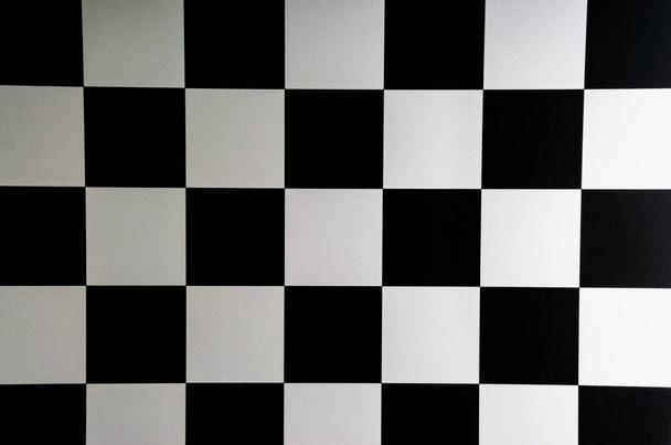 Chess board closeup background. Selective focus and crop fragment - Photo, Image
