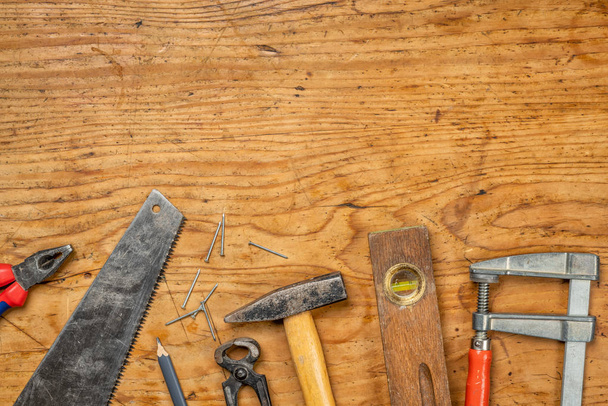 Woodworking tools on a wooden background with copy space - Foto, Imagem