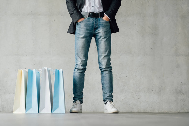 shopping time fashion man legs jeans bags - Fotoğraf, Görsel