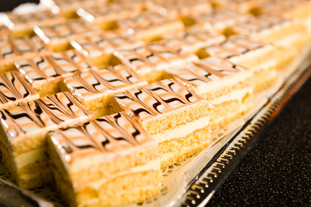 Number of honey cake pieces on tray - Zdjęcie, obraz