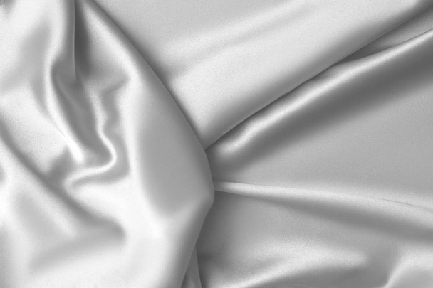 Rippled white silk fabric satin cloth waves background - Foto, afbeelding