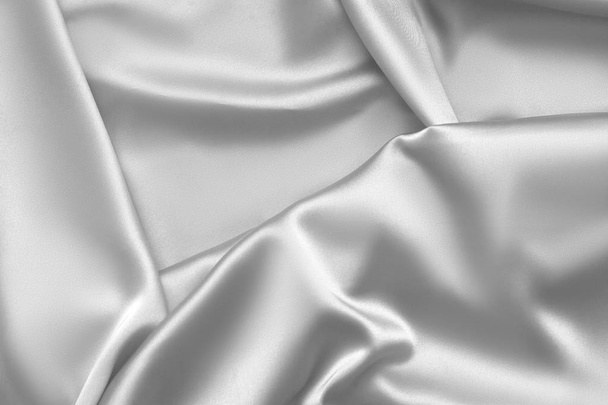 Rippled white silk fabric satin cloth waves background - Foto, immagini