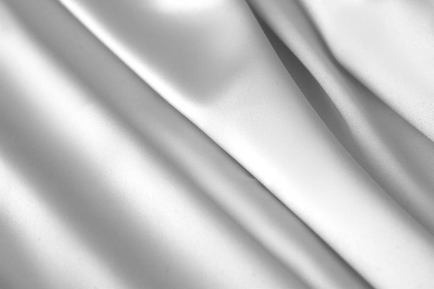 Rippled white silk fabric satin cloth waves background - Foto, Imagen