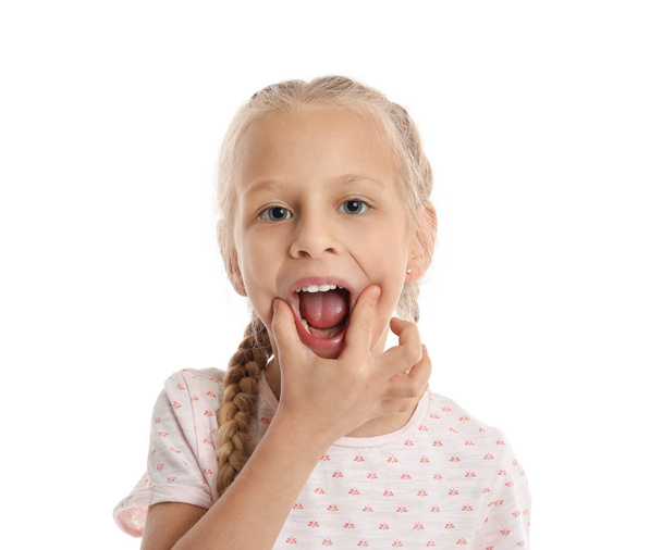 Little girl training pronounce letters on white background - Photo, Image