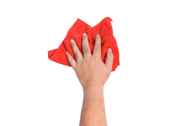 A man's hand Using red rags wipe on white background or isolated - Zdjęcie, obraz