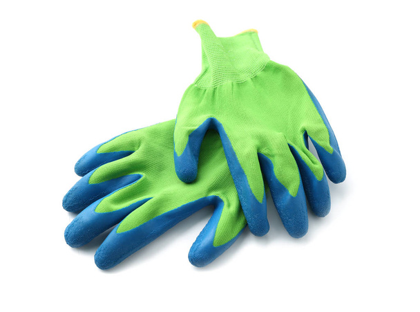 Handschuhe für die Gartenarbeit auf weißem Hintergrund - Foto, Bild