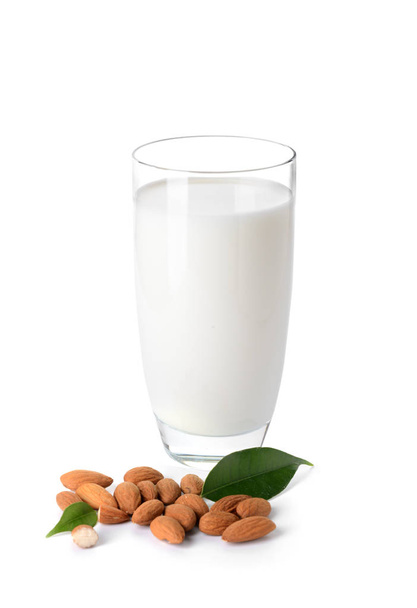 Glass of almond milk on white background - Foto, afbeelding