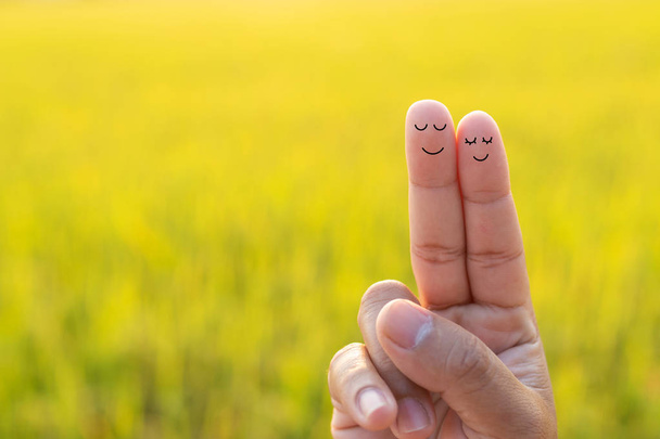 Finger couple in love with field background.  - Photo, Image