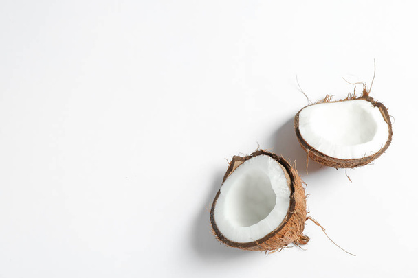 Split tropical coconut isolated on white background - Fotoğraf, Görsel