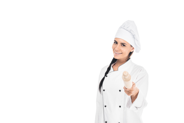 Chef-kok in bedrijf deegroller geïsoleerd op een witte hoed - Foto, afbeelding
