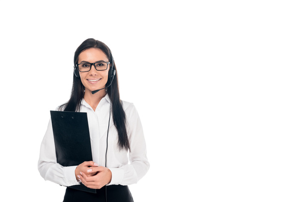 Smiling call center operator in glasses holding clipboard isolated on white - 写真・画像