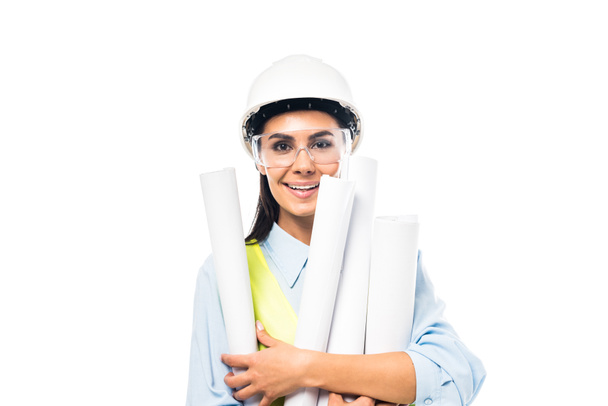 Engineer in hardhat and goggles holding blueprints isolated on white - Photo, Image
