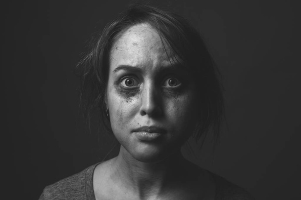 Scared young woman. Black and white portrait - Φωτογραφία, εικόνα