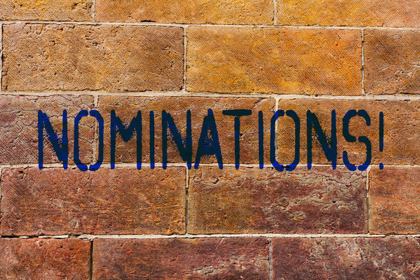 Conceptual hand writing showing Nominations. Business photo showcasing Suggestions of someone or something for a job position or prize Brick Wall art like Graffiti motivational written on wall. - Photo, Image