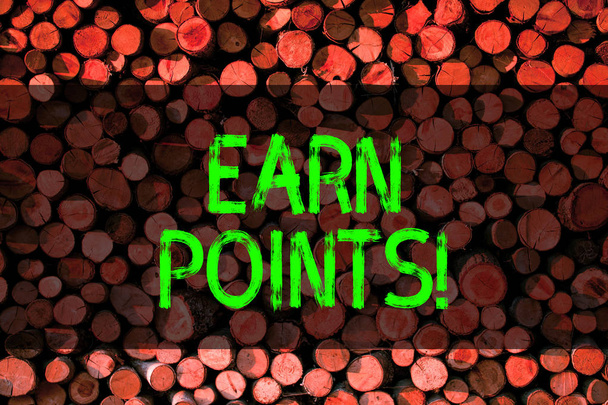 Conceptual hand writing showing Earn Points. Business photo showcasing collecting scores in order qualify to win big prize Wooden background vintage wood wild message ideas thoughts. - Photo, Image