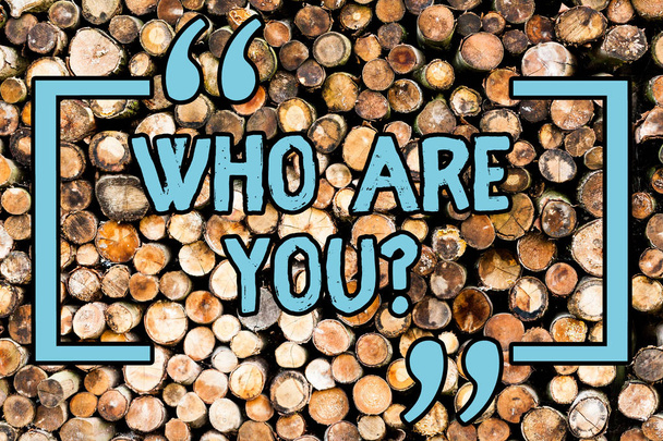 Handwriting text Who Are You Question. Concept meaning asking about its identity or demonstratingal information Wooden background vintage wood wild message ideas intentions thoughts. - Photo, Image