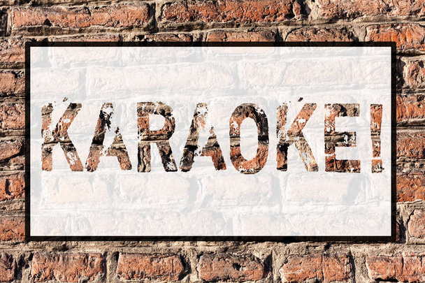Word writing text Karaoke. Business concept for Entertainment singing along instrumental music played by a machine Brick Wall art like Graffiti motivational call written on the wall. - Photo, Image