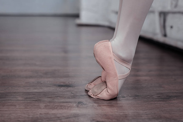 Close up of legs of a professional ballet dancer - Фото, зображення