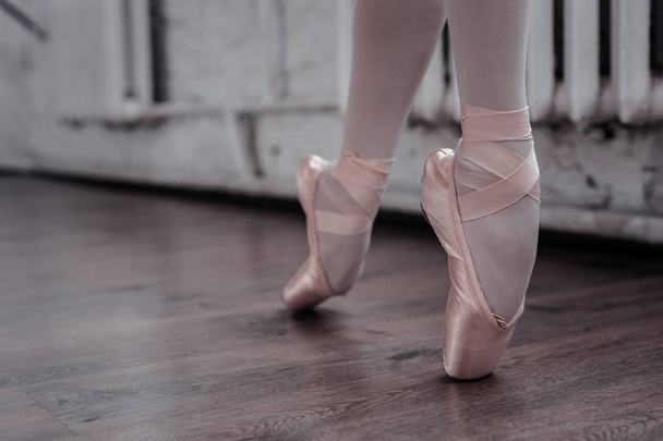 Close up of a foot in pointe shoes - Foto, immagini