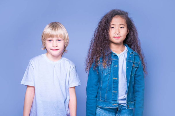 Interracial children. Two children of Caucasian and Asian. Blond - Fotoğraf, Görsel