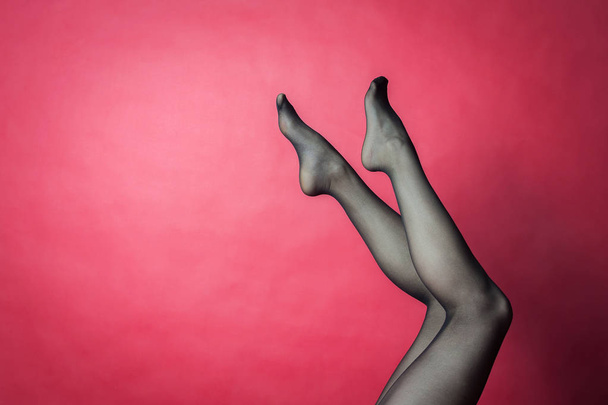 Legs of young caucasian woman in black tights - Foto, Imagem