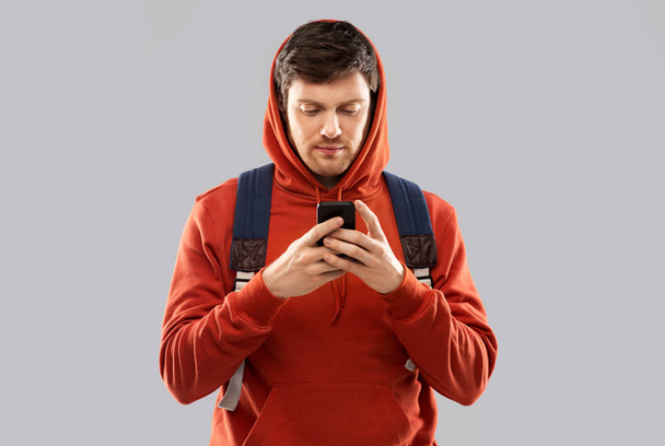 man or student with smartphone and school bag - Фото, зображення