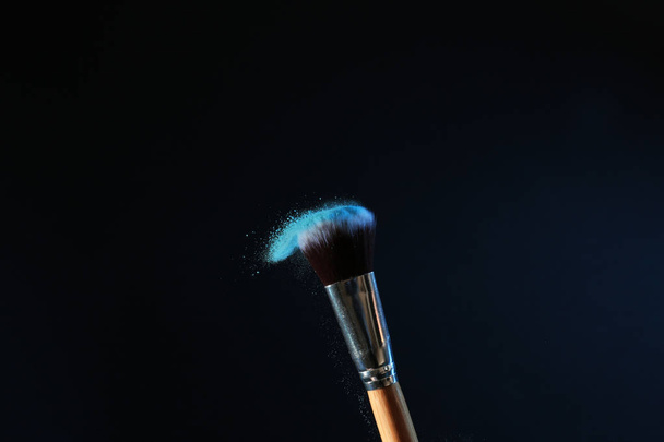 Makeup brush on dark background - Photo, Image