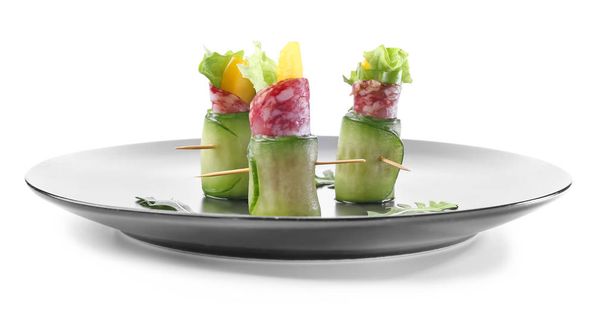 Plate with tasty canapes on white background - Photo, Image