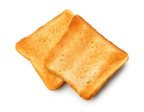 Rebanadas de pan tostado sobre fondo blanco - Foto, Imagen