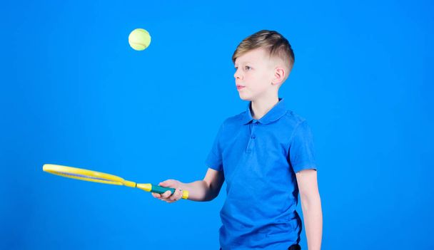 Sport tennis game success. game workout of teen boy. Tennis game player with racket and ball. activity of Llttle boy. Fitness diet brings health and energy. Happy child play tennis. play tennis game - Foto, Imagem