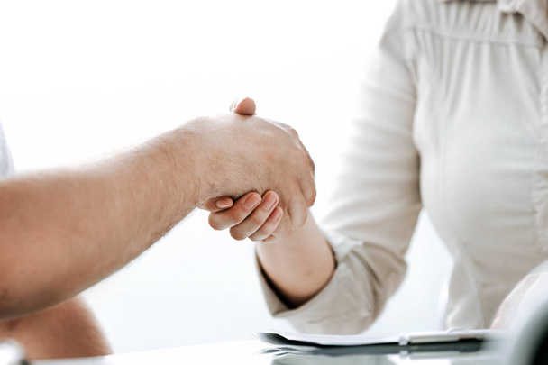 close up. the handshake of a businessman and businesswoman. - Фото, изображение