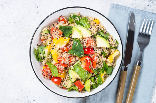 Quinoa salad with fresh vegetables on white. - Photo, Image