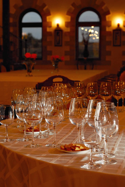 Empty glasses on the table. Wine tasting glasses in the restaurant. - Photo, Image