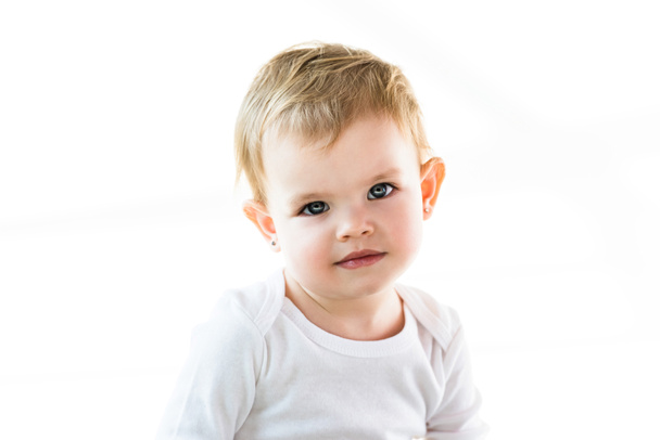 cute child with blonde hair looking at camera isolated on white - Foto, Imagem