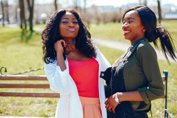 fashionable black girls in a park - Foto, Bild