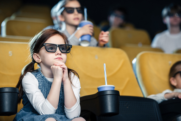 selective focus of cute child in 3d glasses watching movie together with friends - Φωτογραφία, εικόνα