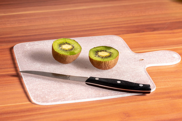 a sliced kiwi  - Fotó, kép