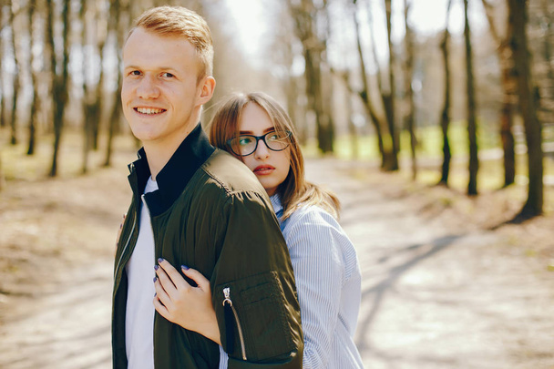 cute couple in a forest - Photo, Image