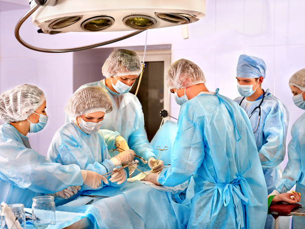 Surgeon at work in operating room. - Photo, Image