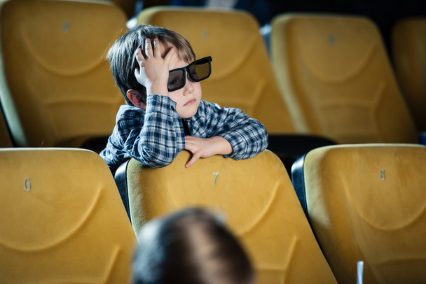 selective focus of cute boy in 3d glasses watching movie in cinema - Photo, Image